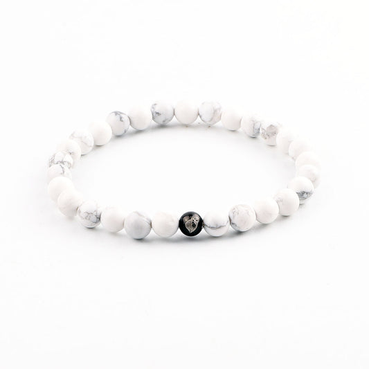 WHITE HOWLITE