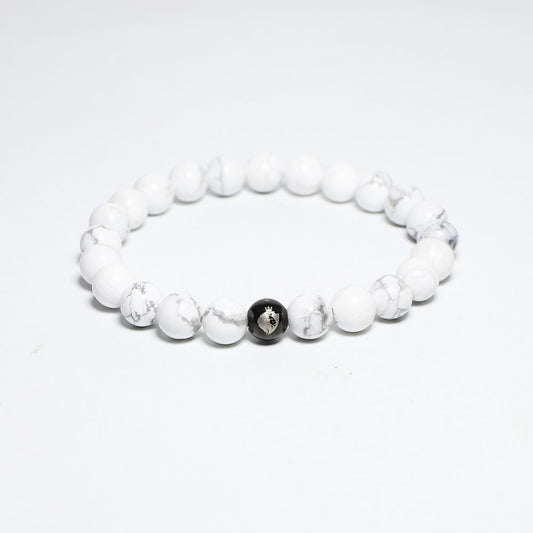 WHITE HOWLITE